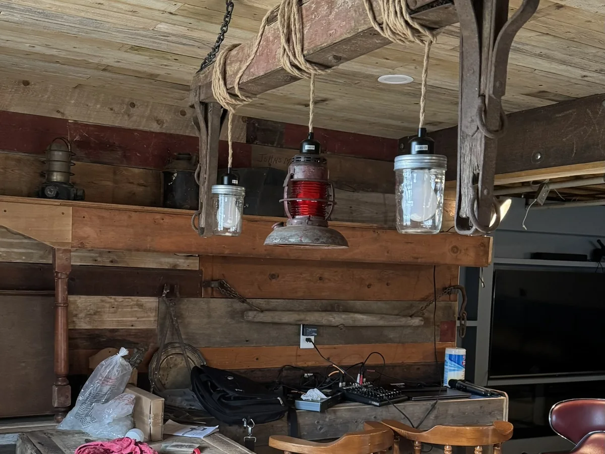 Custom bar light built from an antique horse-wagon frame - project photo